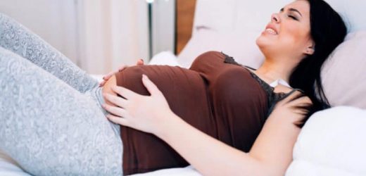 Боль в пупке при беременности