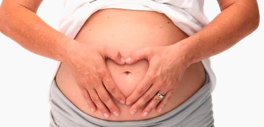 Почему болит пупок при беременности и что делать